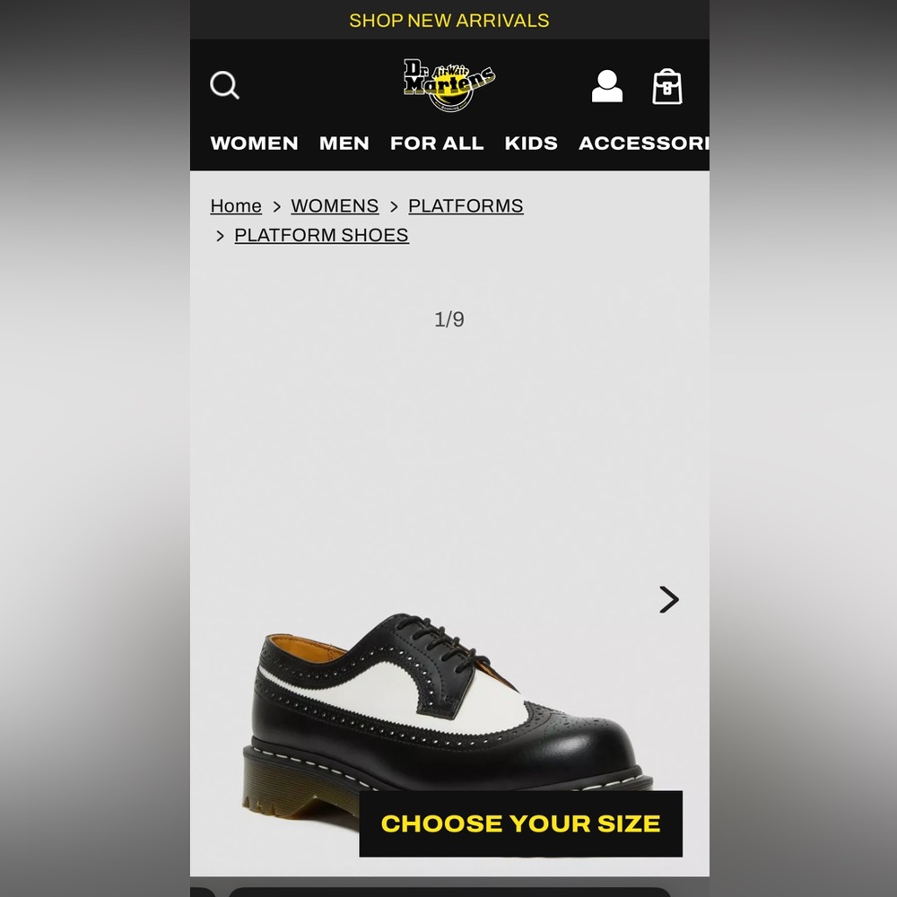 Black and white wing top Oxford shoes